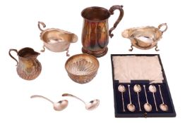 A collection of silverware comprising, a silver tankard engraved with a monogram, a Victorian silver