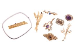 Seven brooches, a pendant and a hinged bangle; to include a rectangular mourning fichu pin with tier