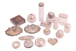 A pair of silver bon bon dishes, a silver mounted glass inkwell the hinged silver cover opening to r