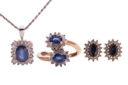 A sapphire and diamond cluster ring, a pendant on chain and a pair of earrings; the cross-over ring 