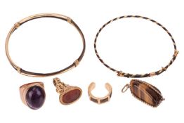 A collection of jewellery items; comprising an open ring of reeded design, set in an 18ct yellow gol