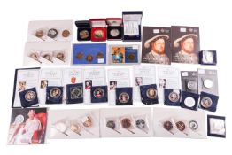 A large collection of UK issued commeorative coins, some with certificates, comprising: two Royal Mi