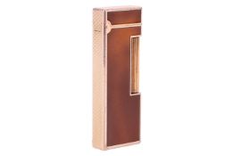 Dunhill - a Rollagas lighter with brown lacquered panels, and engine-turned barley pattern, gilt.
