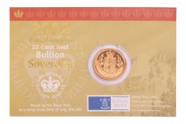 A 2002 Elizabeth II Sovereign, in Royal Mint 'Bullion' packaging.