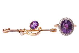 A gem-set ring and a bar brooch; the dress ring centred with an oval fancy-cut amethyst of 11.3 x 9.