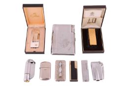 A Dunhill gold-plated Rollagas lighter, with textured finfish, in fitted Dunhil case; together with 