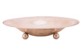 A large German planished bowl, with flared rim, on four ball feet, German marks '800' with maker's m