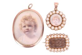 A Victorian mourning brooch and two matching mourning pendants; the brooch of rectangular form, cent