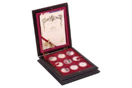 A Royal Mint issued 'Queen Elizabeth II 40th Anniversary Coronation Crown Collection', eighteen coin