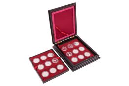 Queen Elizabeth II 40th Anniversary Coronation Crown Collection, encapsulated and boxed.