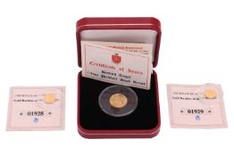 A boxed 1/10 oz gold 2009 British Angel Piedfort high relief coin, with certificate of issue, togeth