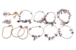 A quantity of Pandora sterling silver jewellery, to include: five snake chain bracelets featuring va
