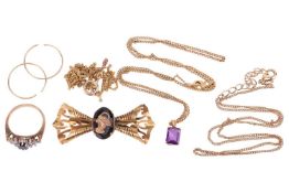 A small aggregate of jewellery items; to include a bow brooch, centred with a faceted hardstone with