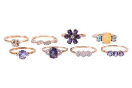 A collection of eight gem-set rings in 9ct gold; including four dress rings set with tanzanite and d
