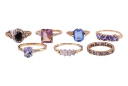 A group of seven gem-set dress rings; to include a synthetic ametrine ring in 9ct gold, size S; a fo