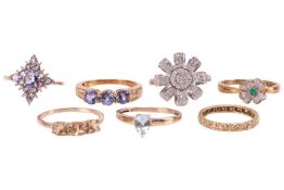 A collection of seven gem-set rings; to include a single-cut diamond eternity ring, in yellow metal 