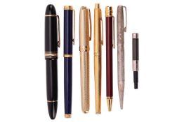 A Cartier Love ballpoint pen in burgundy casing; a Mont Blanc Meisterstruck 149 fountain pen, with b