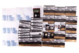 A large group of commemorative coin sets, to include; Michael Collins two-coin set, comprising 20 Eu