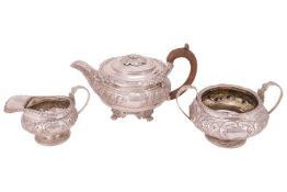 A George III/ William IV silver harlequin tea service; comprising a George III teapot of squat form,