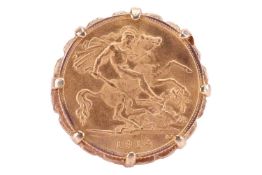 A George V half sovereign ring, dated 1914, claw-set to an openwork scrolled mount with tapering sha
