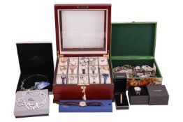 A large quantity of costume jewellery & watches, to include; a floral brooch, with central stone