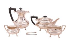An Art Deco silver four-piece tea service, comprising a hot water jug, a teapot, a sugar bowl, a cre