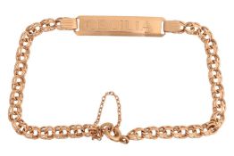 An engraved ID bracelet, the bevelled rectangular plaque engraved with the name 'Cecilia', connected