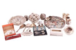 A white metal bowl, circular with beaded borders and scroll pierced sides, on circular spreading foo