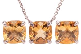 Tiffany- a matching set of gem-set jewellery; comprising a pair of stud earrings set with cushion-sh