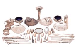 A group of silver and silver-plated items, to include two silver shell dishes, two silver salt cella