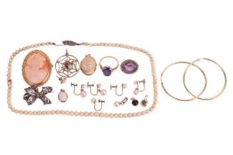 A single stone amethyst dress ring, a late Victorian amethyst and seed pearl oval brooch, a 9ct rose