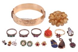 A group of mixed jewellery items including a carved coral pendant depicting Ganesha, in yellow metal