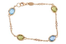 A gem-set bracelet by Kiki McDonough, comprising a cable link chain, alternating with spectacle-set 
