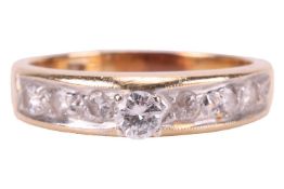 A diamond-set ring, featuring a round brilliant cut diamond with an estimated carat weight of 0.15ct