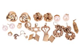 A group of earrings and other items; to include two pairs of stylised knot earrings with clip backs,