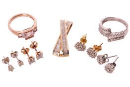 A collection of diamond-set jewellery items including; a crossover pendant set with tapered baguette