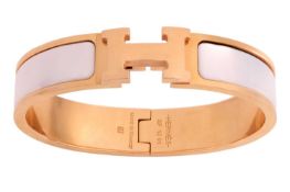 Hermes - a Clic H bracelet, of oval form with hinge opening and 