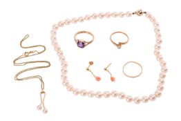 A small group of jewellery items including an amethyst-set dress ring, in yellow metal marked '9ct',
