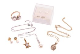 A collection of pearl-set jewellery items; including a 9ct crossover ring set with two half pearls, 