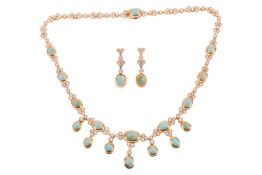 An imitation turquoise and CZ fringe necklace and earring suite; the necklace collet-set with oval c