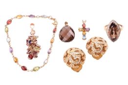 A mixed lot of gem-set jewellery items, comprising a smoky quartz dress ring, the marquise-cut smoky