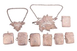 Collection of early 20th-century silver vesta cases (7) and modern vine leaf decanter labels; Sherry