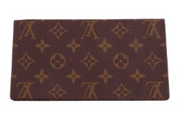 Louis Vuitton - a notebook cover in brown monogram coated canvas, signed, L19.5cm x W10.5cm.