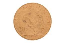 A France 1905 gold 20 Francs coin with Marianne wearing the Phrygian cap on the obverse, and a cock 