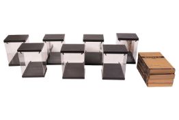 A collection of eleven Legend Studio 'Light House' acyrylic display cases, four in unopened boxes an