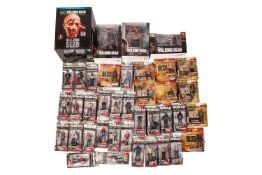 A large collection of Walking Dead collectible figures, to include - McFarlane Toys Daryl Dixon 10 i