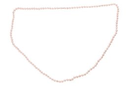 A cultured pearl necklace, the cultured pearls of cream body with pink overtones, measuring approxim