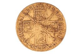A George I guinea, 1716, fourth bust, crowned cruciform shields, sceptres in angles, milled edge, 8.