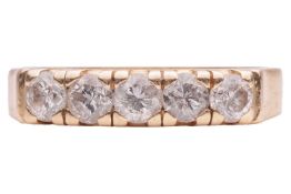 A five stone diamond ring in 14ct gold; featuring a row of five round brilliant cut diamonds of appr