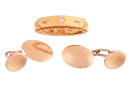 A diamond-set 15ct gold scarf clip and a pair of cufflinks, the scarf clip featuring a central grain
